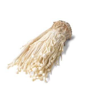 Disse cultivated mushrooms, also called enokitake, are tiny long-stemmed, pale mushrooms that grow and are sold in clusters; they can be used that way or separated by slicing off the base. They have a mild fruity flavor and are slightly crisp in texture.