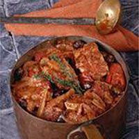 en uncomplicated red wine makes a fine accompaniment to the hearty flavors of onion, garlic, fennel, and olives in this stew.