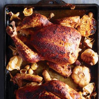 paprika rubbed chickens with roasted garlic