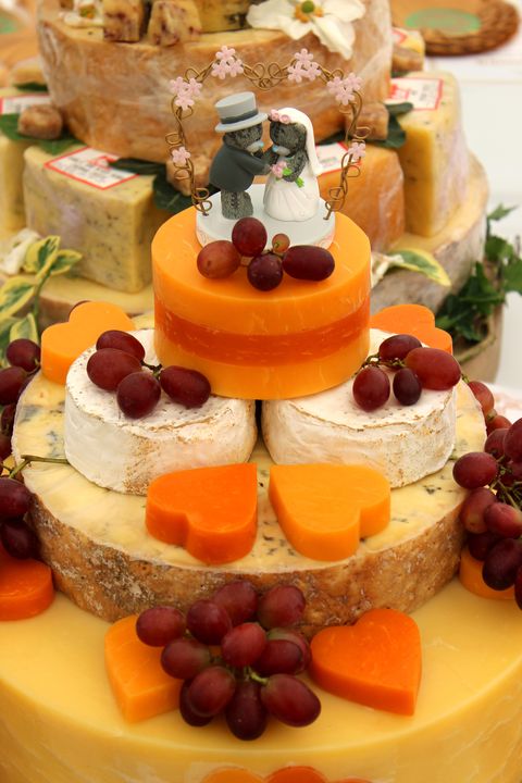 Ost wedding cake, decorated cheese cake, Cheddar, Red-Leicester, brie, grapes